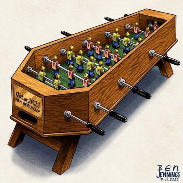 Table football game inside a coffin with a brass engraving saying Qatar 2022 to protest against the World Cup being held there