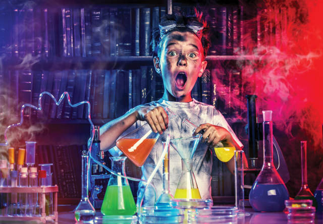 Mad Scientist Kid: Kid who in a lab mixing chemicals in flasks with test tubes and smoke all around them