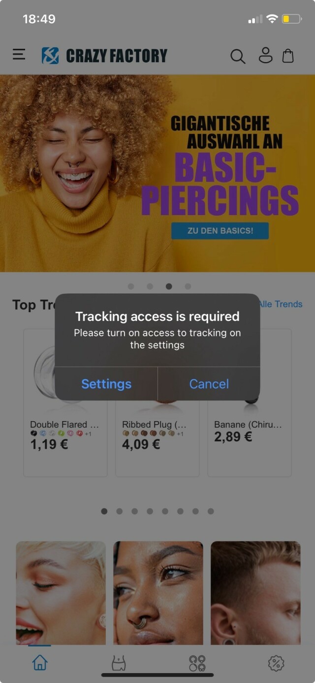Screenshot of the Crazy Factory app with a popup stating "tracking access required, please turn on access to tracking on the settings"