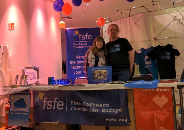Tobias and Bonnie behind the FSFE booth at 37C3
