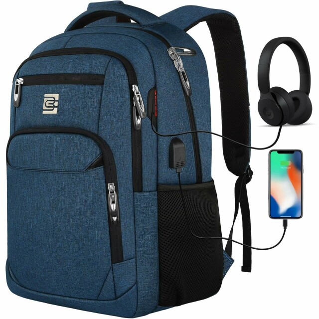 A blue backpack with a charging port passthrough for a phone and a headphone cable passthrough.