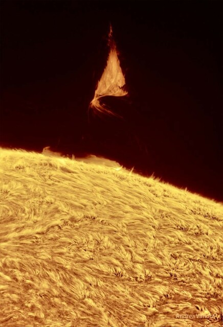 The featured image shows the surface of the Sun with a flowing texture in red light. Above the Sun's surface an unusual triangular prominence hovers.