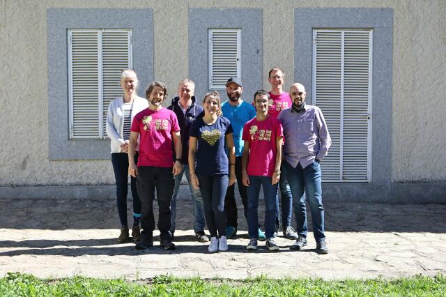 Participants of the FSFE GA 2024 posing. Most of them are wearing different FSFE tshirts