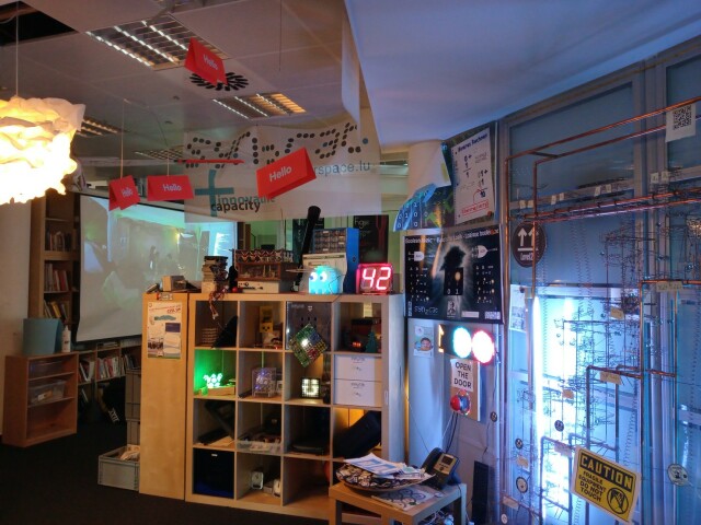 Entrance of the hackerspace with lots of cool stuff including the marbles adder on the right